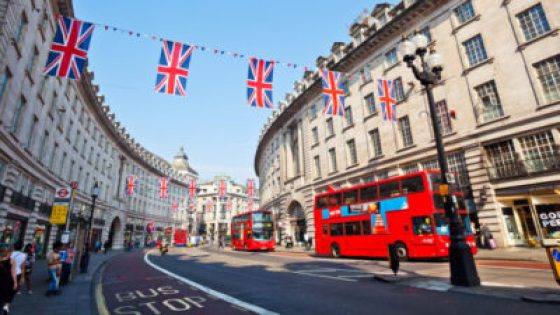 Regents St with red buses and bunting