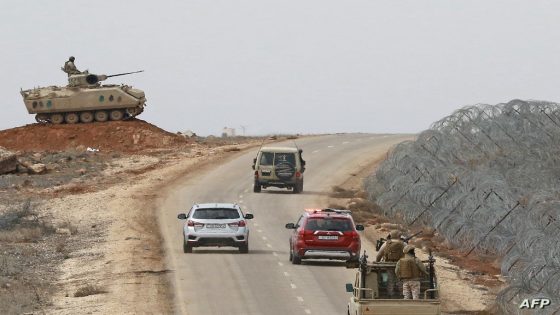 A picture taken during a tour origanized by the Jordanian Army shows soldiers patrolling along the border with Syria to prevent trafficking, on February 17, 2022. Drug trafficking from Syria into Jordan is becoming "organised" with smugglers stepping up operations and using sophisticated equipment including drones, Jordan's army said, warning of a shoot-to-kill policy. Since the beginning of this year, Jordan's army has killed 30 smugglers and foiled attempts to smuggle into the kingdom from Syria 16 million Captagon pills -- more than they seized in the whole of 2021 -- the military said. (Photo by Khalil MAZRAAWI / AFP)