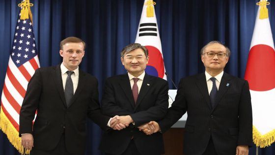 South Korea's National Security Adviser Cho Tae-yong, center, shakes hands with U.S. National Security Advisor Jake Sullivan, left, and Japan's National Security Secretariat Secretary-General Takeo Akiba after their joint news conference at the presidential office, Saturday, Dec. 9, 2023, in Seoul, South Korea. The meeting comes as the three countries are stepping up cooperation amid North Korea's persistent military threats and Russia's protracted war in Ukraine. (Chung Sung-Jun/Pool Photo via AP)