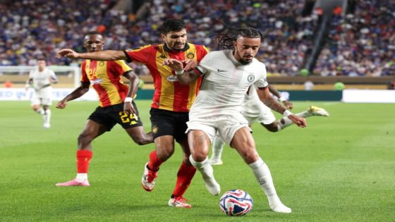 PHILADELPHIA, PENNSYLVANIA - JUNE 24: Malo Gusto #27 of Chelsea FC is challenged by Mohamed Benali #2 of Esperance De Tunisie during the FIFA Club World Cup 2025 group D match between Esperance de Tunis and Chelsea FC at Lincoln Financial Field on June 24, 2025 in Philadelphia, Pennsylvania. Francois Nel/Getty Images/AFP (Photo by Francois Nel / GETTY IMAGES NORTH AMERICA / Getty Images via AFP)