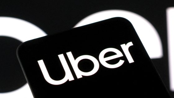 FILE PHOTO: Uber logo is seen in this illustration taken August 5, 2025. REUTERS/Dado Ruvic/Illustration/File Photo